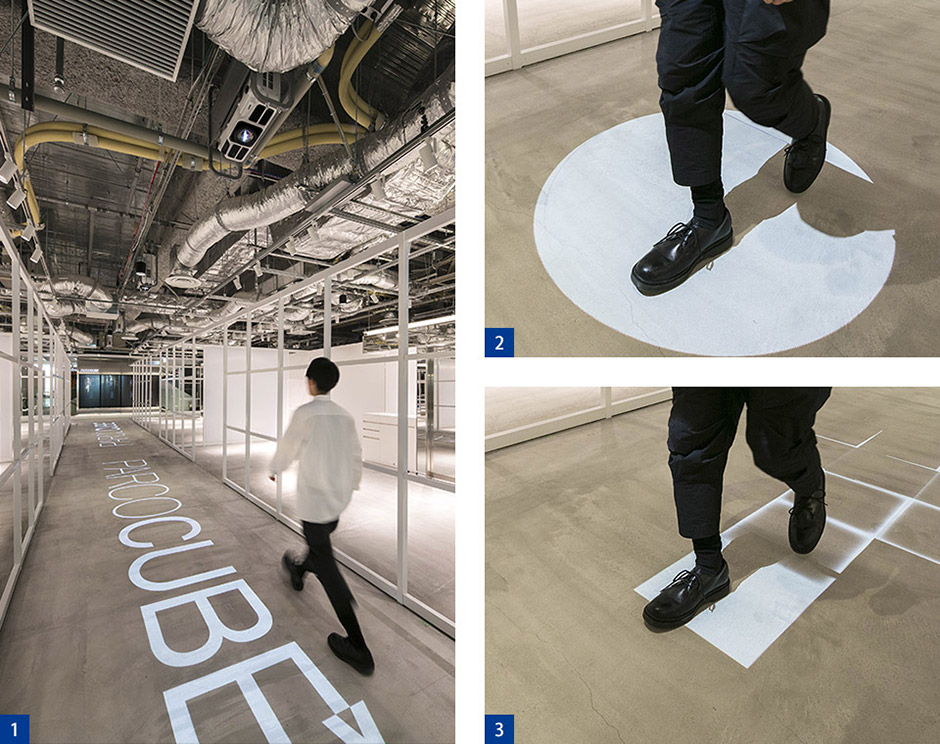  1. 渋谷パルコ 5階フロアに設けられた空間演出装置『Root F』。ロゴ演出など、時間で切り替わる演出が現在6種類設定されている。2. 歩く人にスポットライトが追従する演出。3. 歩く人の周りにスクエアタイル模様の映像が広がる演出。