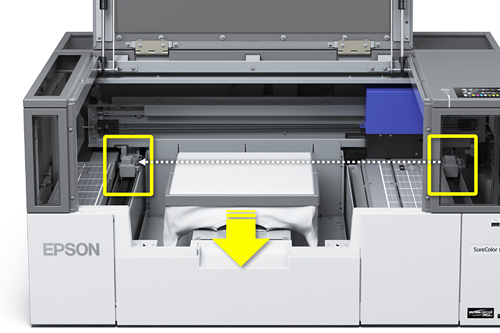 プラテンの両側にあるセンサーでメディアを検知する画像